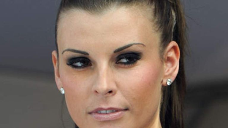 Coleen Rooney at last year's Ladies' Day at the Aintree racecourse