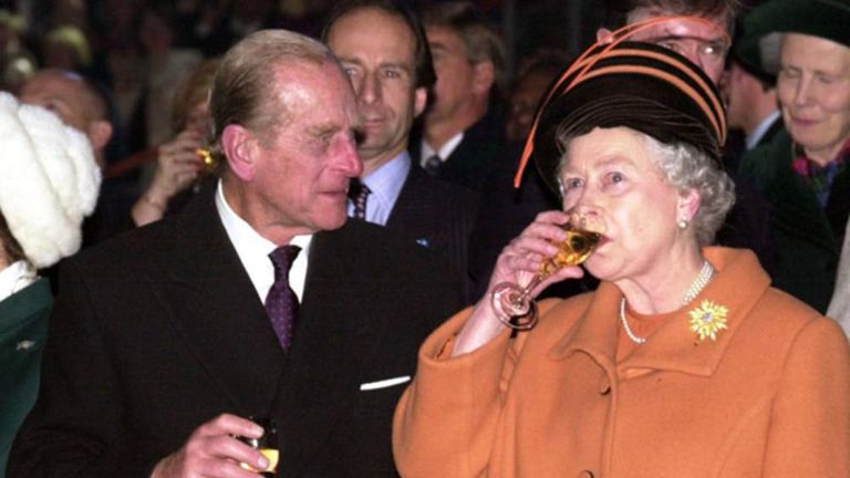 Prince Philip and the Queen toast the new millennium during celebrations at the Millennium Dome in London