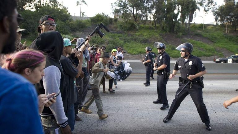 Protesters in the US clash with police as George Zimmerman is cleared.