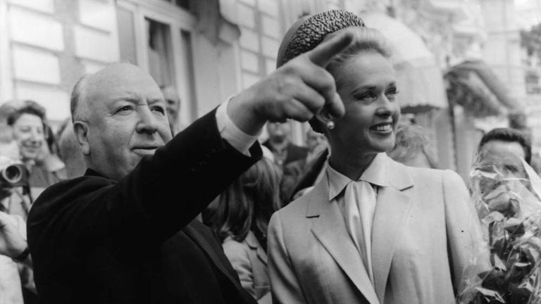 9th May 1963:  Alfred Hitchcock and American actress Tippi Hedren explore Cannes together after the premiere of his latest thriller 'The Birds' in which she plays the title role.