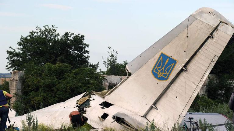 A picture taken on July 14, 2014 shows the wreckage of a Ukrainian AN-26 military transport plane after it was shot down by a missile in the village of Davydo-Mykilske.