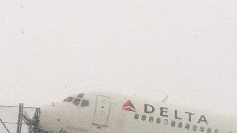 Delta Jet Skids Off Runway At NY's LaGuardia Airport During Snowstorm