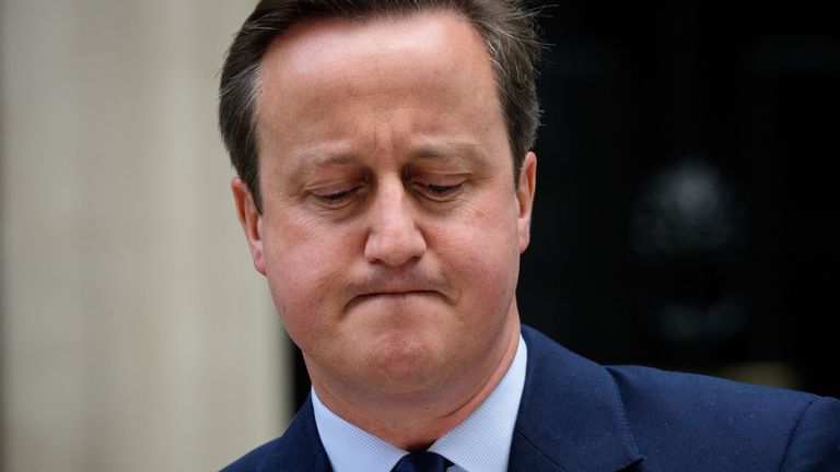 Grim-faced David Cameron outside Number 10 Downing Street 