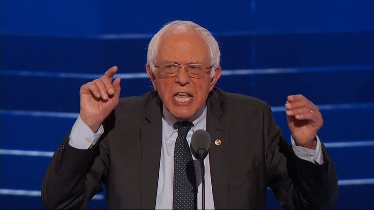 Bernie Sanders backs Hillary Clinton at the DNC