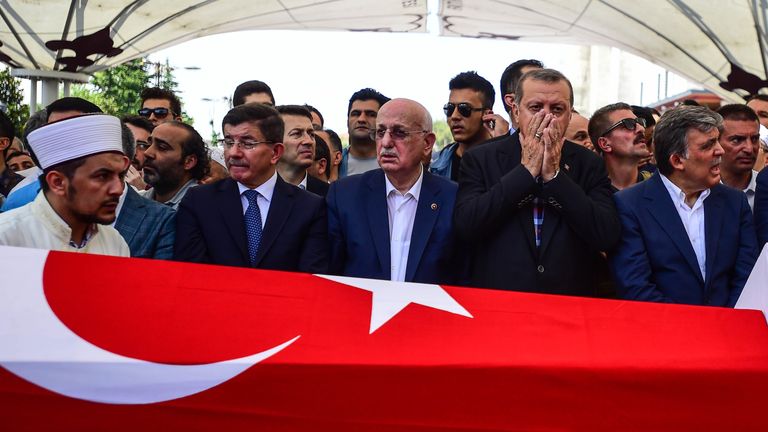 Turkish President Recep Tayyip Erdogan attends a funeral for victims of the coup