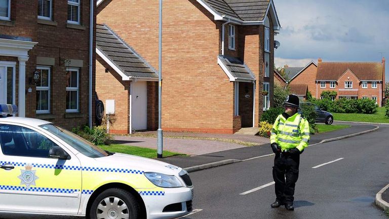 Police close a road in Saxilby, Lincolnshire leading to a house which was raided in connection with the attack in Woolwich, London
