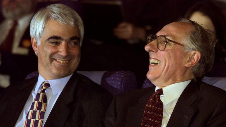 Scottish Secretary Donald Dewar (R) celebrates after hearing the first declaration in favour of the "Yes Yes" decision from the devolution referendum as Chief Secretary to the Treasury Alistair Darling looks on September 11, 1997
