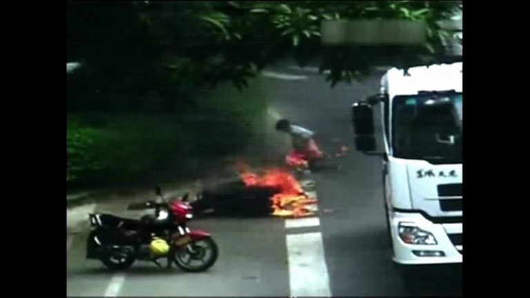 Motorcyclist Set Ablaze In China Lorry Crash | World News | Sky News