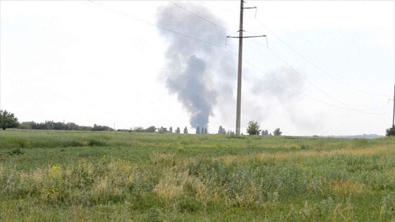 Smoke rising from military helicopter shot down by Ukraine rebels