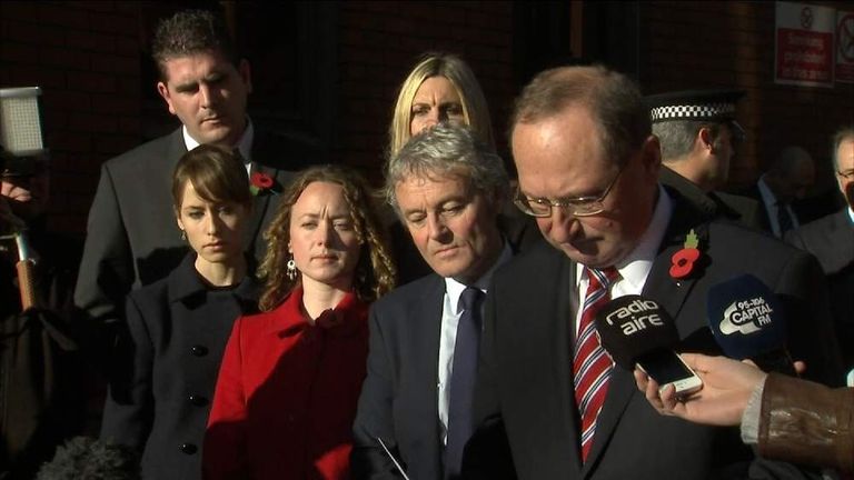 A statement from Ann Maguire's family is read outside court
