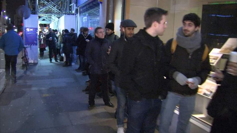 People queuing in London to buy Charlie Hebdo