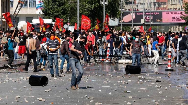 Demonstrators clash with police during a protest against Turkey's PM Erdogan and his ruling AKP in central Ankara