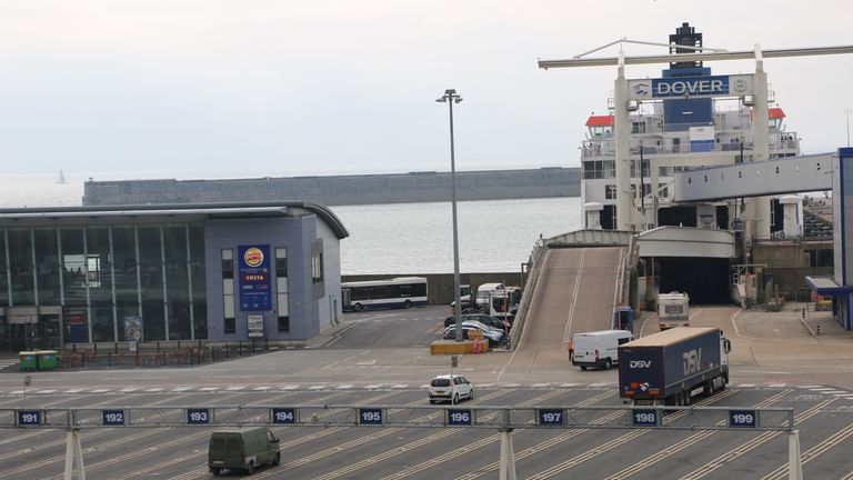 Cars board a ferry at Dover after some people queued for 15 hours to get through customs