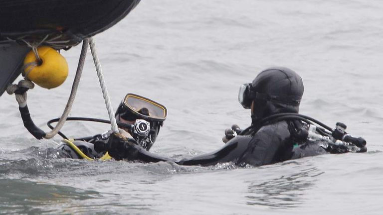 Divers Smashing Ferry Walls To Recover Bodies | World News | Sky News