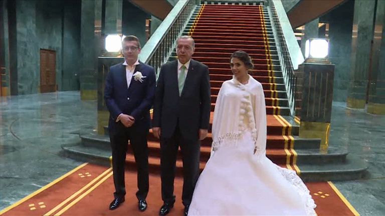Turkey&#39;s president meets a newlywed couple at the presidential palace