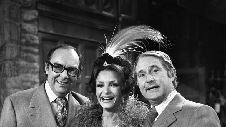 File photo dated 8/12/1976 of Ernie Wise and Eric Morecambe with Kate O'Mara