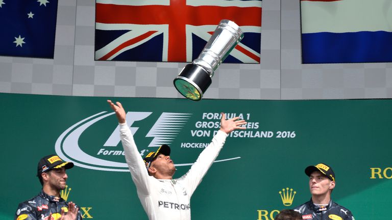 Lewis Hamilton celebrates his victory in the German Grand Prix