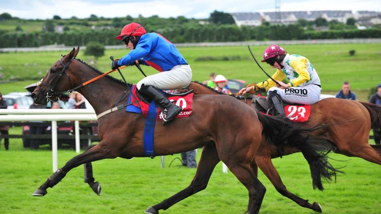 Plain Talking ridden by Brien Kane (left) before winning the TheTote.com Handicap Hurdle on the third day of the Galway Festival.