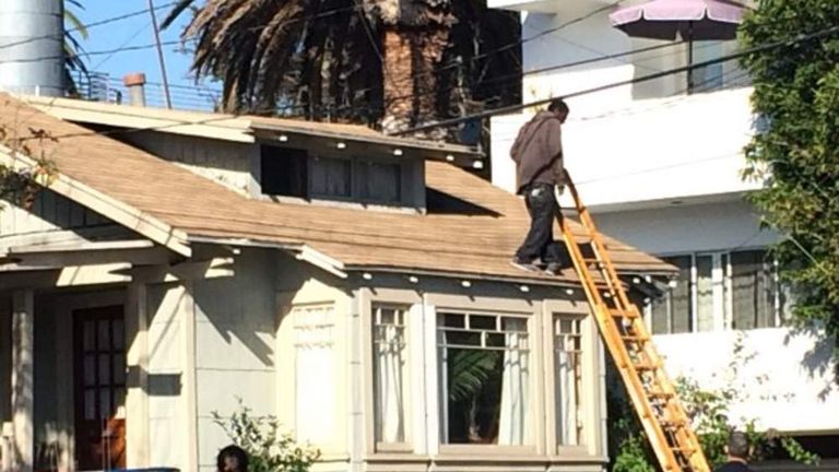 Woman Hides On House Roof To Escape Intruder Us News Sky News 