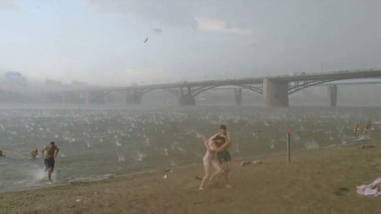 Giant Hailstones Batter Sunbathers On Beach World News Sky News