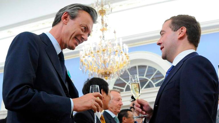 Russian President Medvedev talks to Japan Tobacco International President and CEO Labouchere during an award ceremony at the Gorki presidential residence outside Moscow