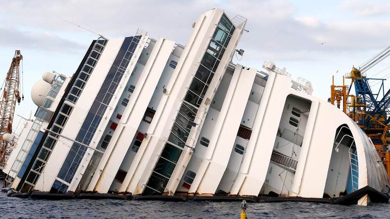 The capsized cruise liner Costa Concordia is pictured outside Giglio harbour