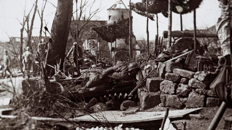 An undated archive picture shows a French soldier resting on the Maubeuge road at Ferriere la Grande, Northern France