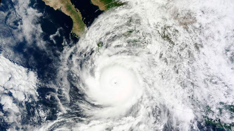 Hurricane Odile is pictured off the west coast of the United States as it approaches the Baja Peninsula in this September 14, 2014 NASA handout satellite image