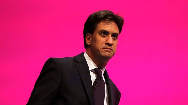 Ed Miliband, leader of Britain's opposition Labour Party, arrives on stage at the party's conference in Manchester