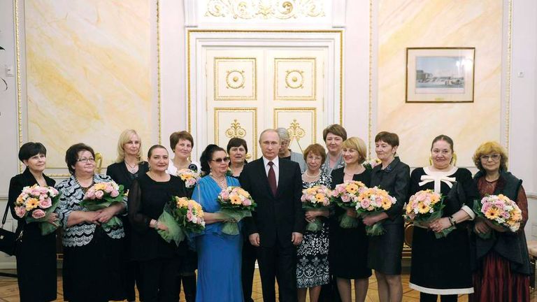 Russian President Putin meets with women to congratulate them on the International Women's Day in Moscow