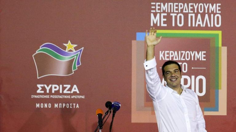 Former Greek prime minister and leader of leftist Syriza party Alexis Tsipras waves to supporters after winning general election in Athens