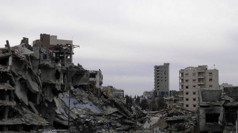 A general view of damaged buildings are seen in the besieged area of Homs