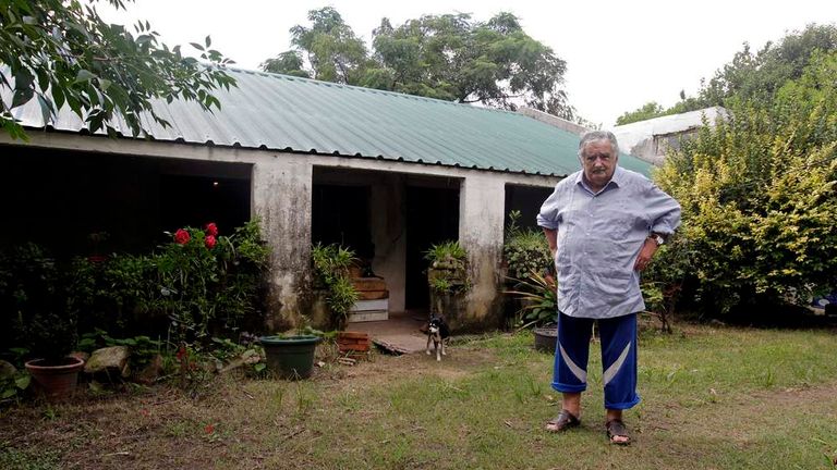 Uruguay's President Mujica poses in front of his farmhouse following an interview with Reuters, on the outskirts of Montevideo