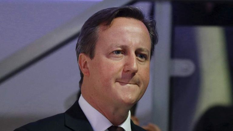 Britain's Prime Minister David Cameron waits to address guests at an event.