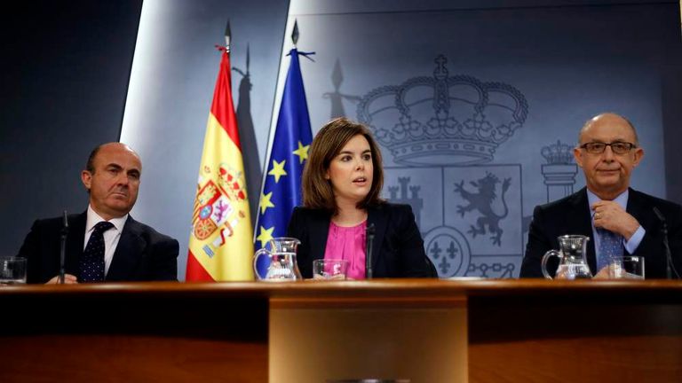 Spanish Economy Minister de Guindos, Deputy Prime Minister Saenz de Santamaria and Treasury Minister Montoro