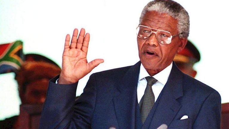 South African President Nelson Mandela takes the o