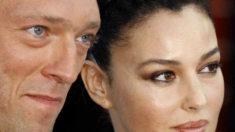 Italian actress Monica Bellucci and actor Vincent Cassel arrive for screening of 'Indigenes' at the 59th Cannes Film Festival