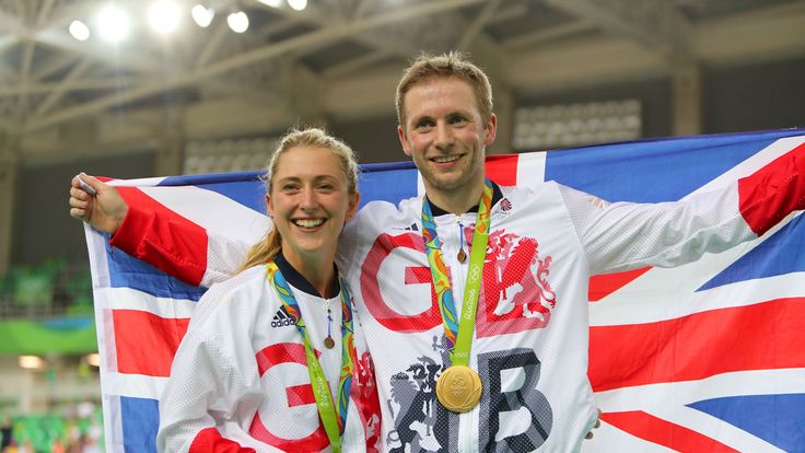 Great Britain's Jason Kenny after winning the gold medal in the Keirin poses with fiance Laura Trott who won gold in the omnium