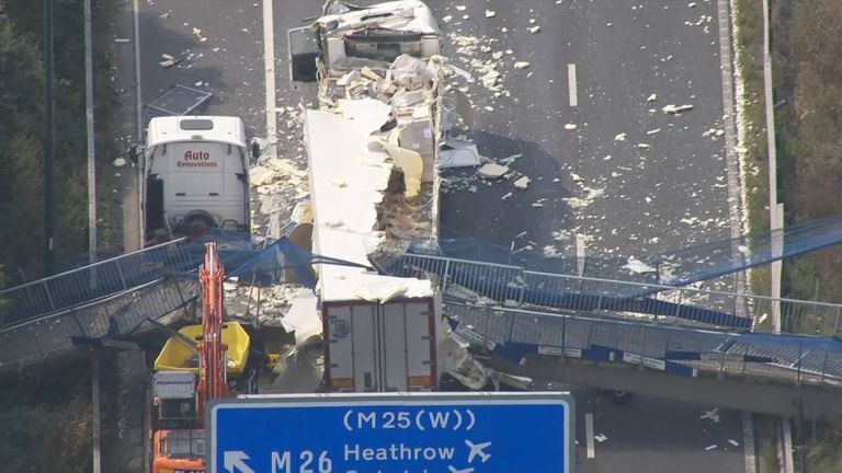 The collapsed footbridge over the M20