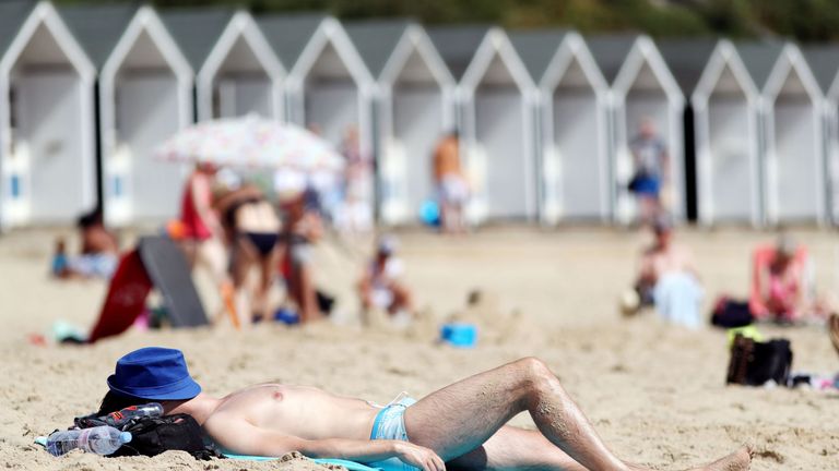 The heatwave has brought sun worshippers out to beaches around the UK