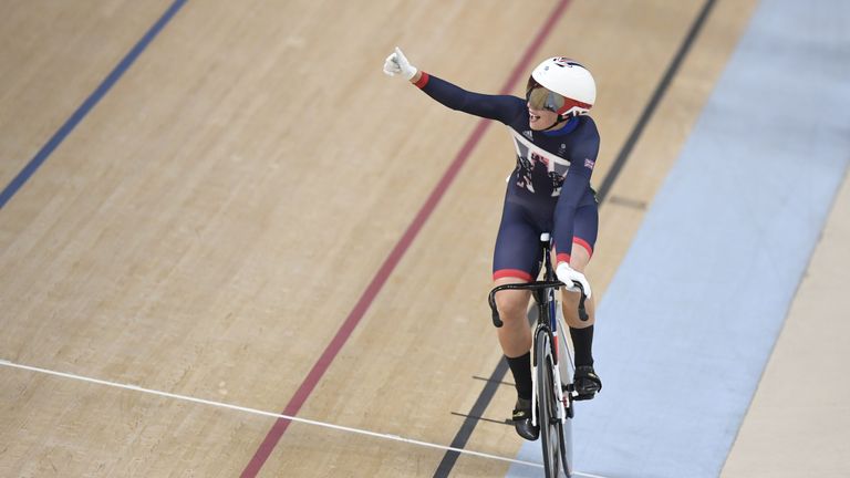 Cyclist Becky James celebrates securing a silver in the women&#39;s Keirin