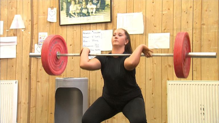 Woman lifts weights gerenic
