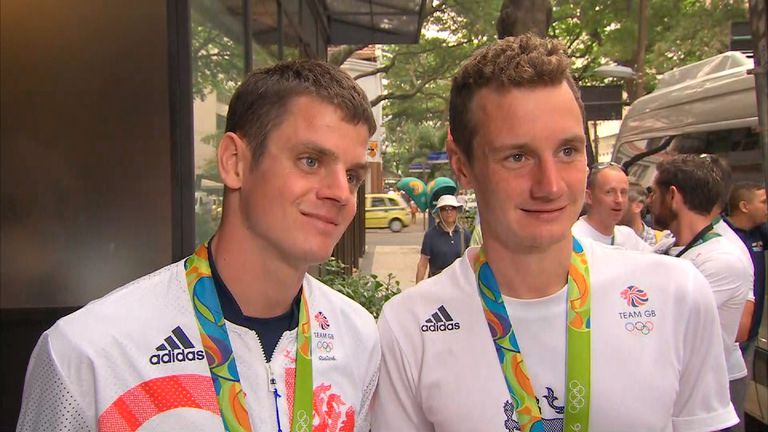 Alistair Brownlee (R) and brother Jonny (L) celebrate their success in Rio