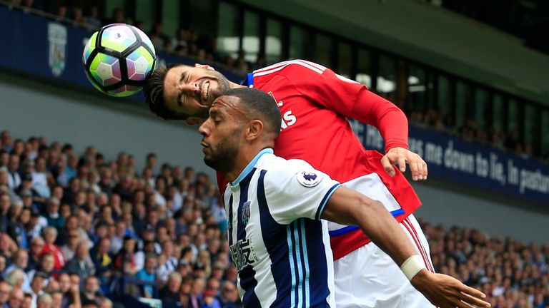 Antonio Barragan (up) wins a header from Matty Phillips during the West Brom v Middlesbrough match in the Premier League