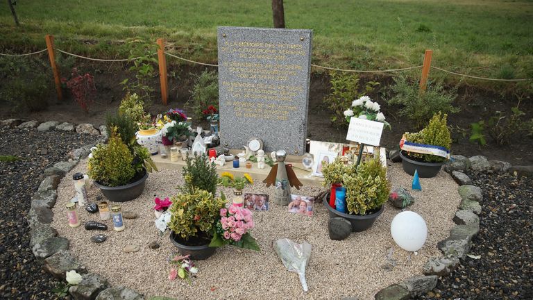Tributes left by mourners lie at a memorial to the victims of the Germanwings crash