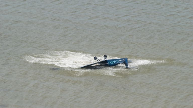 The plane ends up upside down in the water