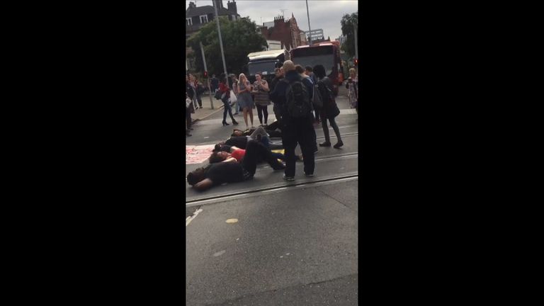 Demonstrators shut down part of the city centre tram and bus network