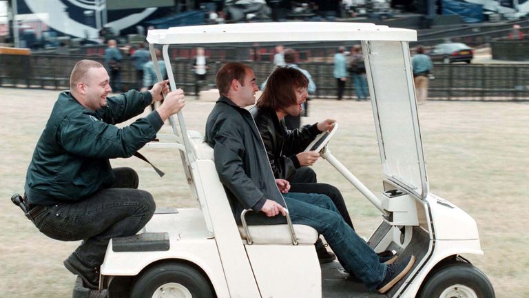 Liam on a golf buggy in Knebworth in 96