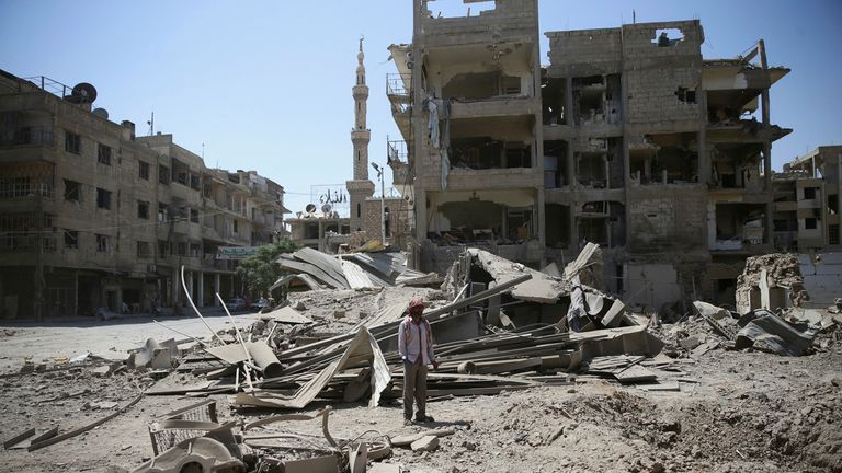 The damage after an airstrike in a rebel-held part of Damascus on Monday