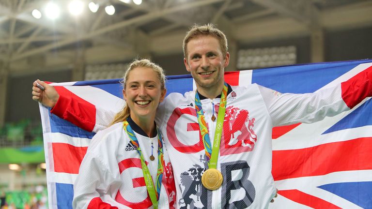 Great Britain's Jason Kenny after winning the gold medal in the Keirin poses with fiance Laura Trott who won gold in the omnium